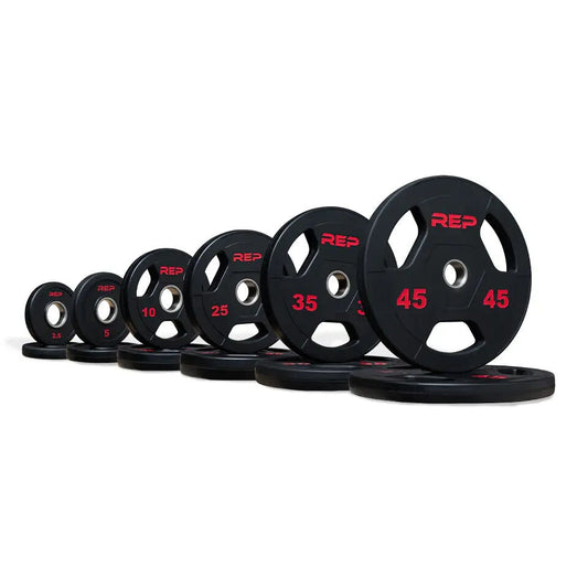 Pares de placas olímpicas recubiertas de goma Rep Fitness de 45 lb, 35 lb, 25 lb